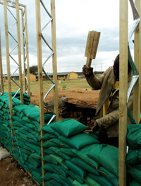 Constructing wall with sandbags
